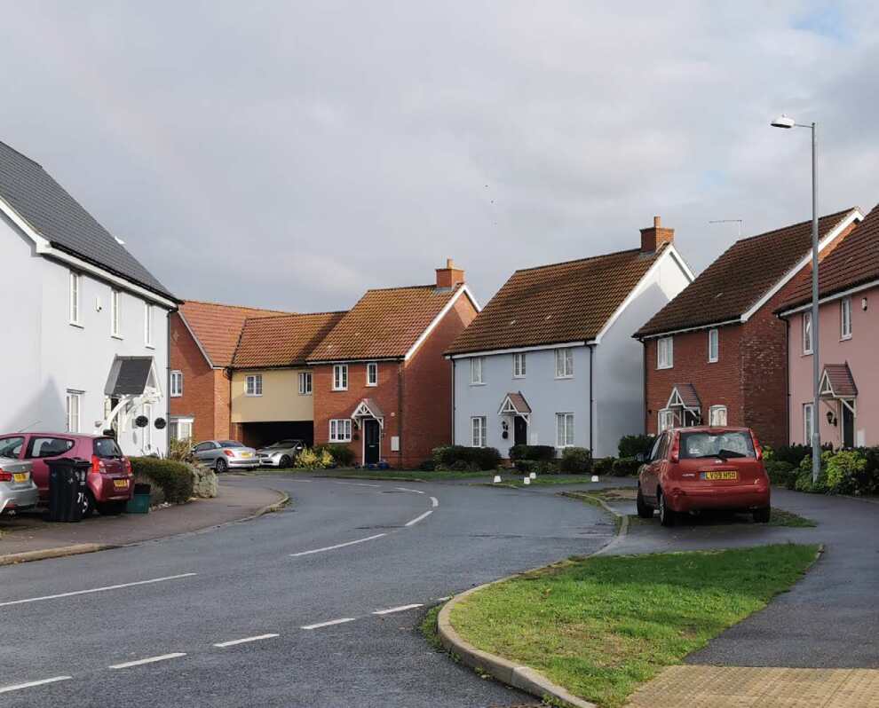 row of detached houses along a street