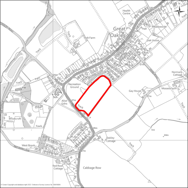 A grayscale map showing the boundary of the Land south of Orchard Close, Great Oakley with a red outline. 