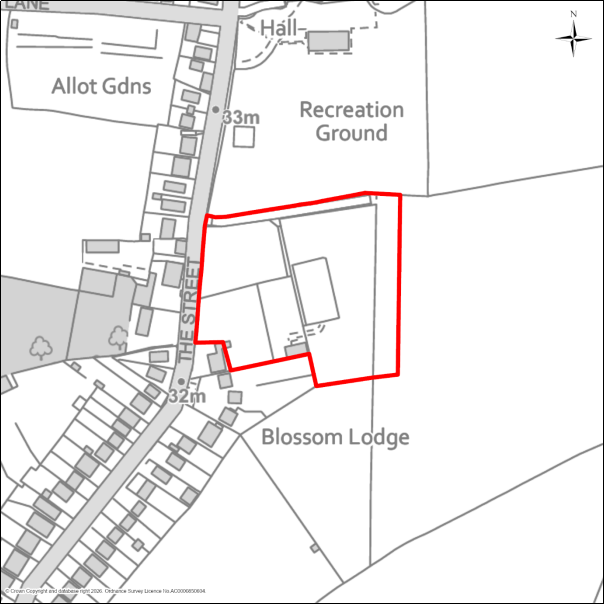 A grayscale map showing the boundary of Paddock Site South of Bradfield Playing Field, East of the Street, Bradfield with a red outline. 